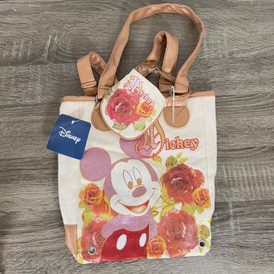 LOT 130B: Disney Bags w/ Tags - Mickey Mouse Wristlets, Eeyore Shoulder Bag, Colorful Roses Mickey Canvas Tote & More