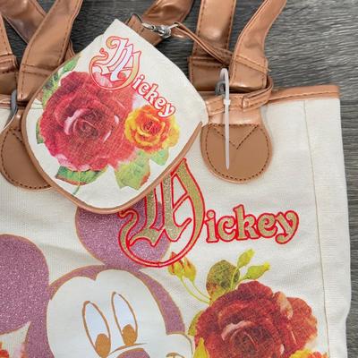 LOT 130B: Disney Bags w/ Tags - Mickey Mouse Wristlets, Eeyore Shoulder Bag, Colorful Roses Mickey Canvas Tote & More