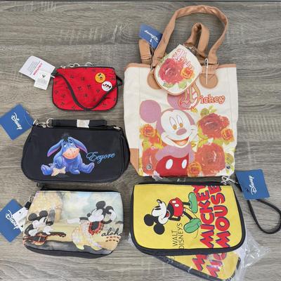 LOT 130B: Disney Bags w/ Tags - Mickey Mouse Wristlets, Eeyore Shoulder Bag, Colorful Roses Mickey Canvas Tote & More