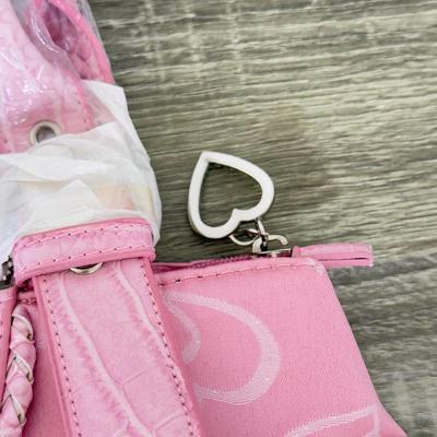 LOT 134B: Pink Purse Collection - Prada Wallet, Heart Bags & Nine West w/ Tag