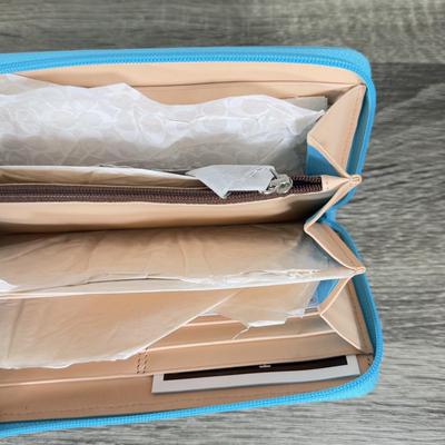 LOT 137B: Three Coach Wallets - One w/ Tag, 2 w/ Paperwork