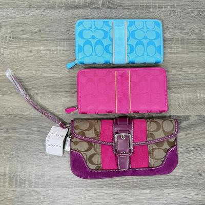 LOT 137B: Three Coach Wallets - One w/ Tag, 2 w/ Paperwork