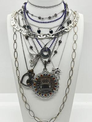 LOT 183J: Eclectic Silvertone Necklace Collection: Playboy Bunny, Rod Stewart, Liberty Bell and More