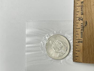 LOT 214J: George Washington Birthday .90 Silver Half Dollar