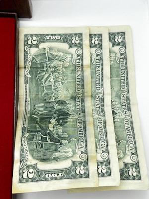 LOT 221J: US Currency Collection: 1957 $1 Silver Certificate, 1980 Susan B. Anthony Souvenir Set, 1997 Coin Set, Bag of Wheat Pennies