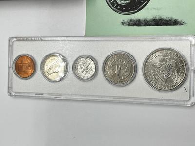 LOT 221J: US Currency Collection: 1957 $1 Silver Certificate, 1980 Susan B. Anthony Souvenir Set, 1997 Coin Set, Bag of Wheat Pennies