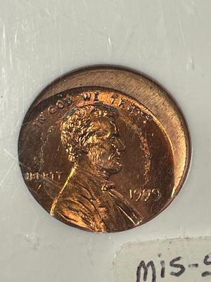 NGC CERTIFIED 1999 MS64 RED OFF CENTER ERROR LINCOLN CENT AS PICTURED. FREE DOMESTIC SHIPPING.