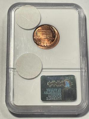 NGC CERTIFIED 1999 MS64 RED OFF CENTER ERROR LINCOLN CENT AS PICTURED. FREE DOMESTIC SHIPPING.