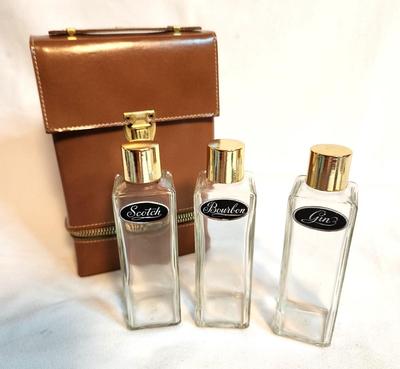 Lot #68 Cool MCM Traveling Bar with 3 decanters