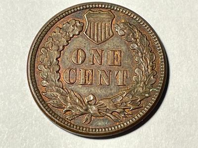 1887 AU+/UNCIRCULATED CONDITION BROWN INDIAN HEAD CENT AS PICTURED. FREE DOMESTIC SHIPPING.