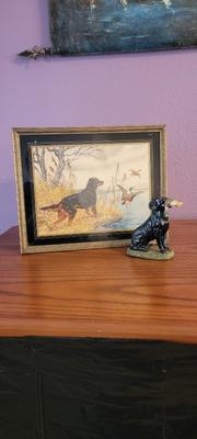 Framed art and dog figurine