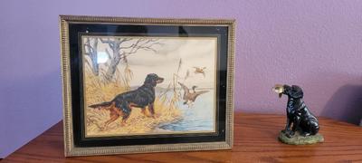Framed art and dog figurine