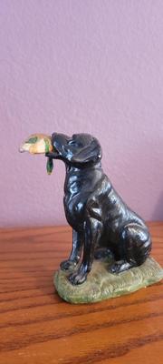 Framed art and dog figurine