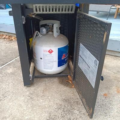 LOT 182: Legacy Heating Steel Propane Fire Pit Table 50000 BTU