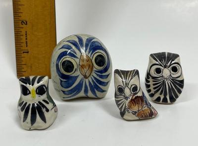 Sale Photo Thumbnail #95: 4 abstract owl figurines, all in good condition. The largest one is approx. 2" tall.