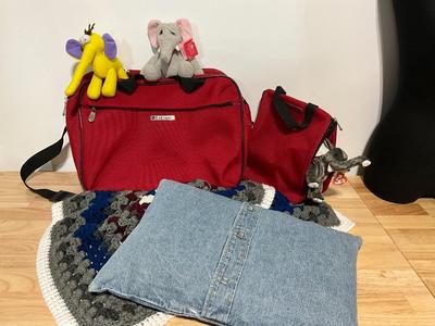 Leisure travel bags, throw, pillow, stuffed animals.