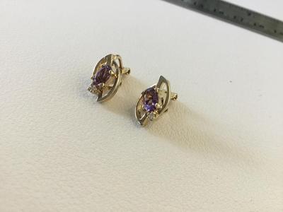 Beautiful purple center clip on earrings