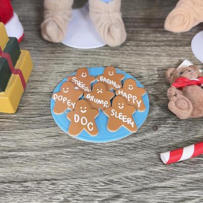 LOT 301B: Vintage Retired Disney Christmas Snow White and the Seven Dwarfs Ashton Drake Galleries Porcelain Dolls w/ Wooden Backdrop