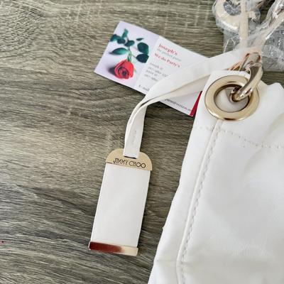 LOT 308B: White Hand Bags - Jimmy Choo & Nine West w/ Tag