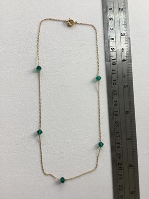 Gold tone green beaded collar necklace