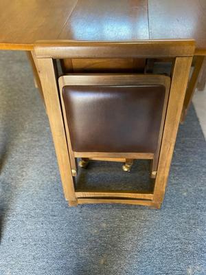 MID-CENTURY GATELEG DINING TABLE WITH 4 FOLDING CHAIRS STORED INSIDE THE TABLE