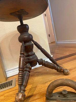 ANTIQUE PIANO STOOL AND CAST CLOTHES IRON