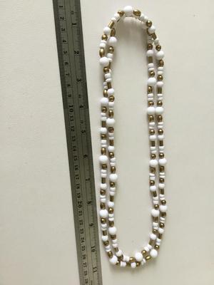Gold tone white plastic long beaded fashion necklace