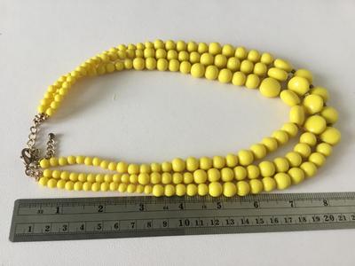 Yellow three layer beaded necklace