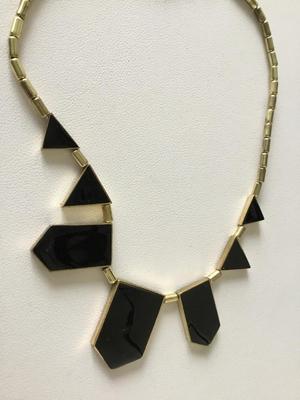 Gold tone plastic statement necklace