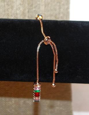 Very Colorful Line of Stones Bracelet (9") on a Rose Gold Setting & Bolo Clasp
