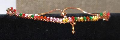 Very Colorful Line of Stones Bracelet (9") on a Rose Gold Setting & Bolo Clasp