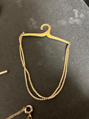 Tie clasps, clips, lapel pins and dresser jar