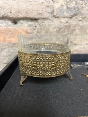 Tie clasps, clips, lapel pins and dresser jar