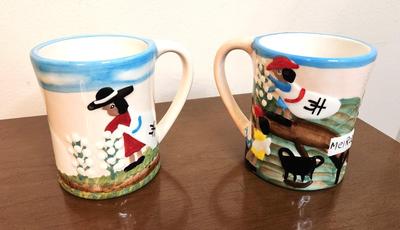 Lot #147 Pair of Clementine Hunter Mugs - "Cotton Picking" and "A Day at Melrose Plantation"