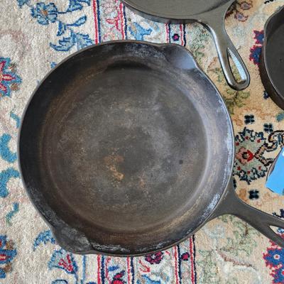 3 cast Iron Pans Erie 9b , 8.5 , Lodge 9, + 1 French Fish Pan