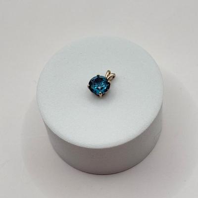 LOT 82J: 14k White Gold Teal Blue Topaz Pendant (1.2gtw)