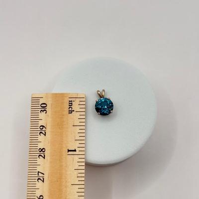 LOT 82J: 14k White Gold Teal Blue Topaz Pendant (1.2gtw)