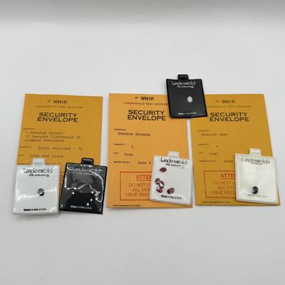 LOT 106J: Lindenwold Jewelers Loose Stones in Package - Garnet, Onyx, Cubic Zirconia