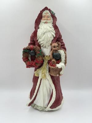 LOT 131K: Three Signed 1990s Hand Painted Santa Figurines