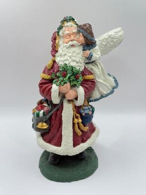 LOT 131K: Three Signed 1990s Hand Painted Santa Figurines