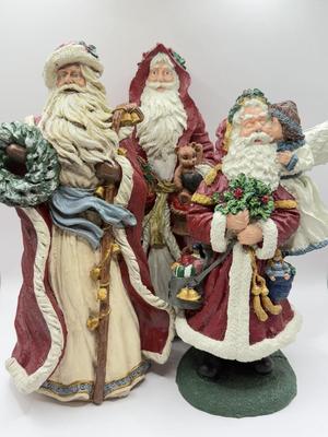 LOT 131K: Three Signed 1990s Hand Painted Santa Figurines