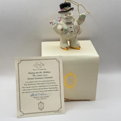 LOT 133K: Lenox Christmas Ornaments w/ Boxes - 2002 Snowman, 2001 Snowmen on Sled, 2003 Skating Snowman & 2000 Snowman