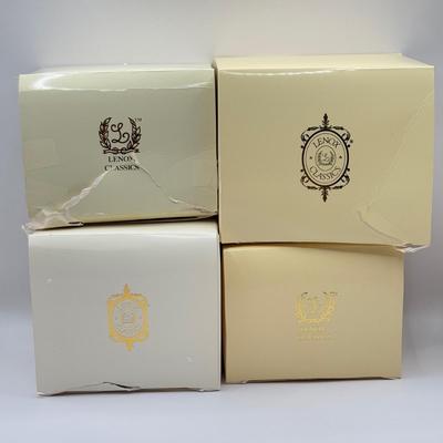 LOT 133K: Lenox Christmas Ornaments w/ Boxes - 2002 Snowman, 2001 Snowmen on Sled, 2003 Skating Snowman & 2000 Snowman