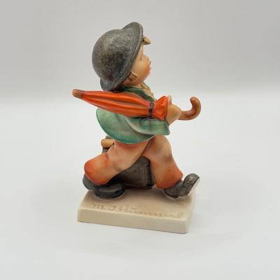 LOT 136K: Vintage Goebel MI Hummel Porcelain Figurines - "Little Gabriel" 32/0, "Happy Traveler" 109/0 &...