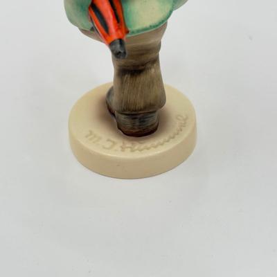 LOT 136K: Vintage Goebel MI Hummel Porcelain Figurines - "Little Gabriel" 32/0, "Happy Traveler" 109/0 &...