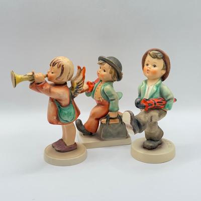 LOT 136K: Vintage Goebel MI Hummel Porcelain Figurines - "Little Gabriel" 32/0, "Happy Traveler" 109/0 &...