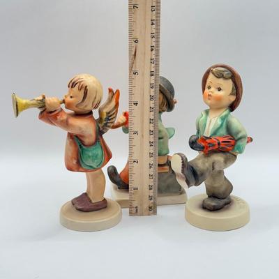 LOT 136K: Vintage Goebel MI Hummel Porcelain Figurines - "Little Gabriel" 32/0, "Happy Traveler" 109/0 &...