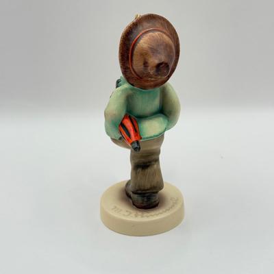 LOT 136K: Vintage Goebel MI Hummel Porcelain Figurines - "Little Gabriel" 32/0, "Happy Traveler" 109/0 &...