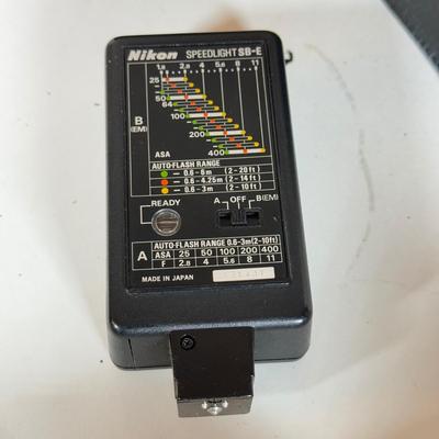 LOT 158B: Nikon EM 35mm Film Camera w/ Flash SB-E, Bag, Lens & Paperwork