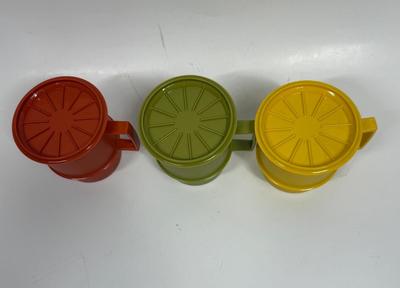 3 Vintage Tupperware Stackable Sealable Coffee Mugs with lids/coasters green orange yellow